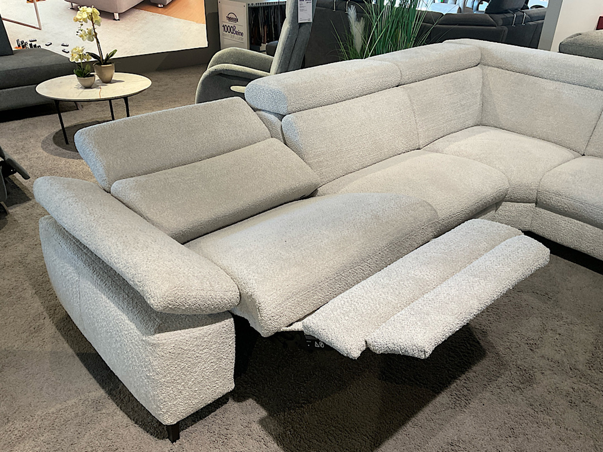 Modulmaster Ecksofa inkl. vielen Funktionen und Hocker in Boucle Stoff