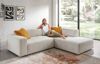 Ecksofa im Trendstoff Cord mit elektrischem Sitzvorzug mgl. Beige links
