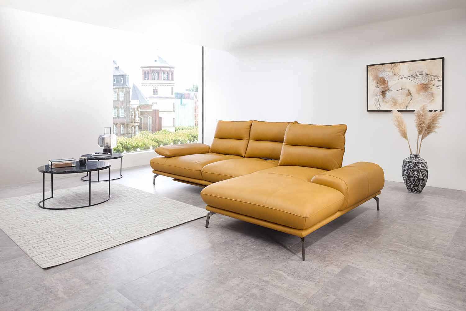 Leder Ecksofa mit manueller Sitztiefenverstellung Leder Ecksofa mit manueller Sitztiefenverstellung