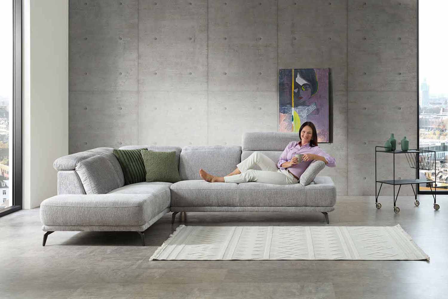 Ecksofa inkl. Kopfteilverstellung in Stoff
