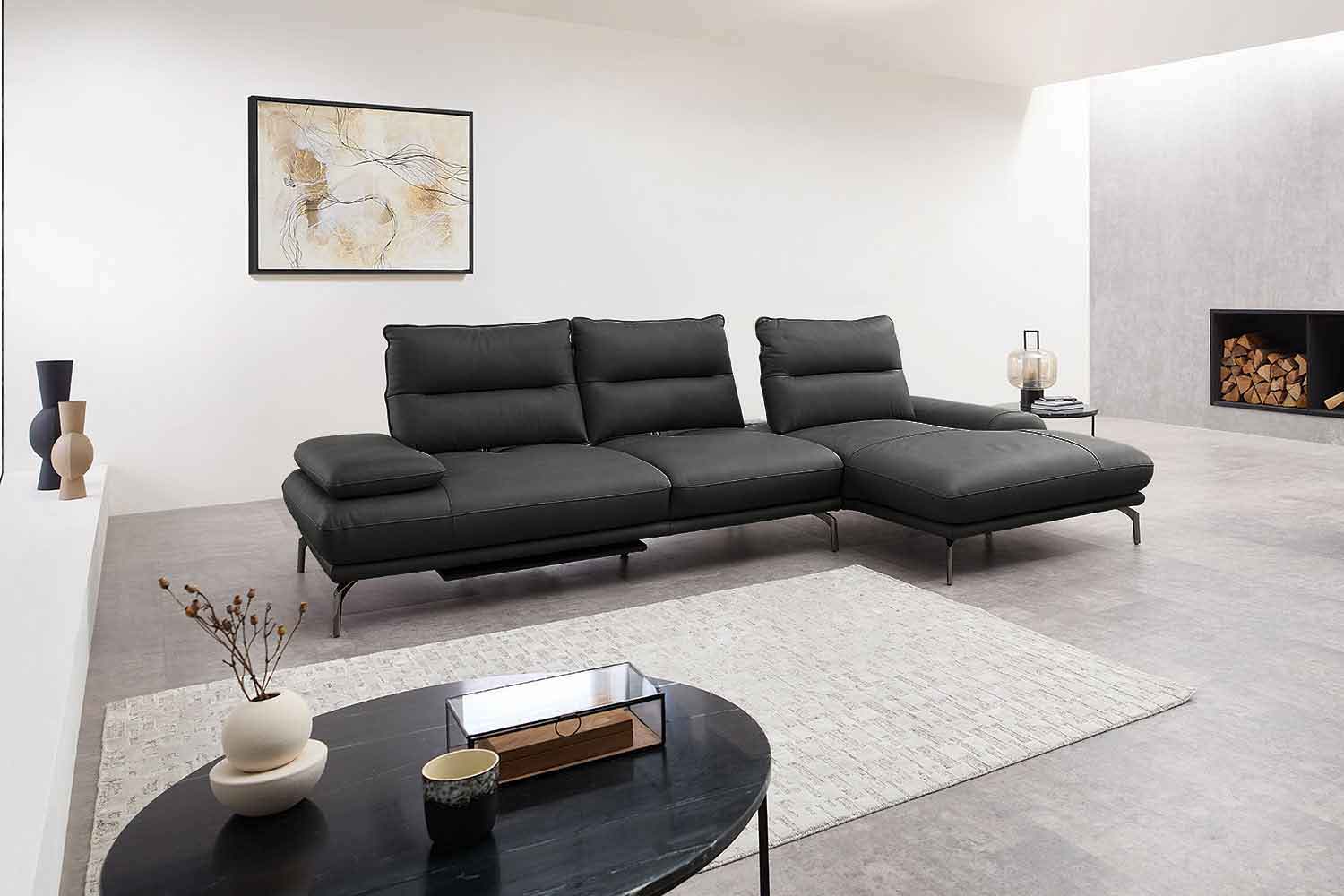 Leder Ecksofa mit manueller Sitztiefenverstellung Leder Ecksofa mit manueller Sitztiefenverstellung