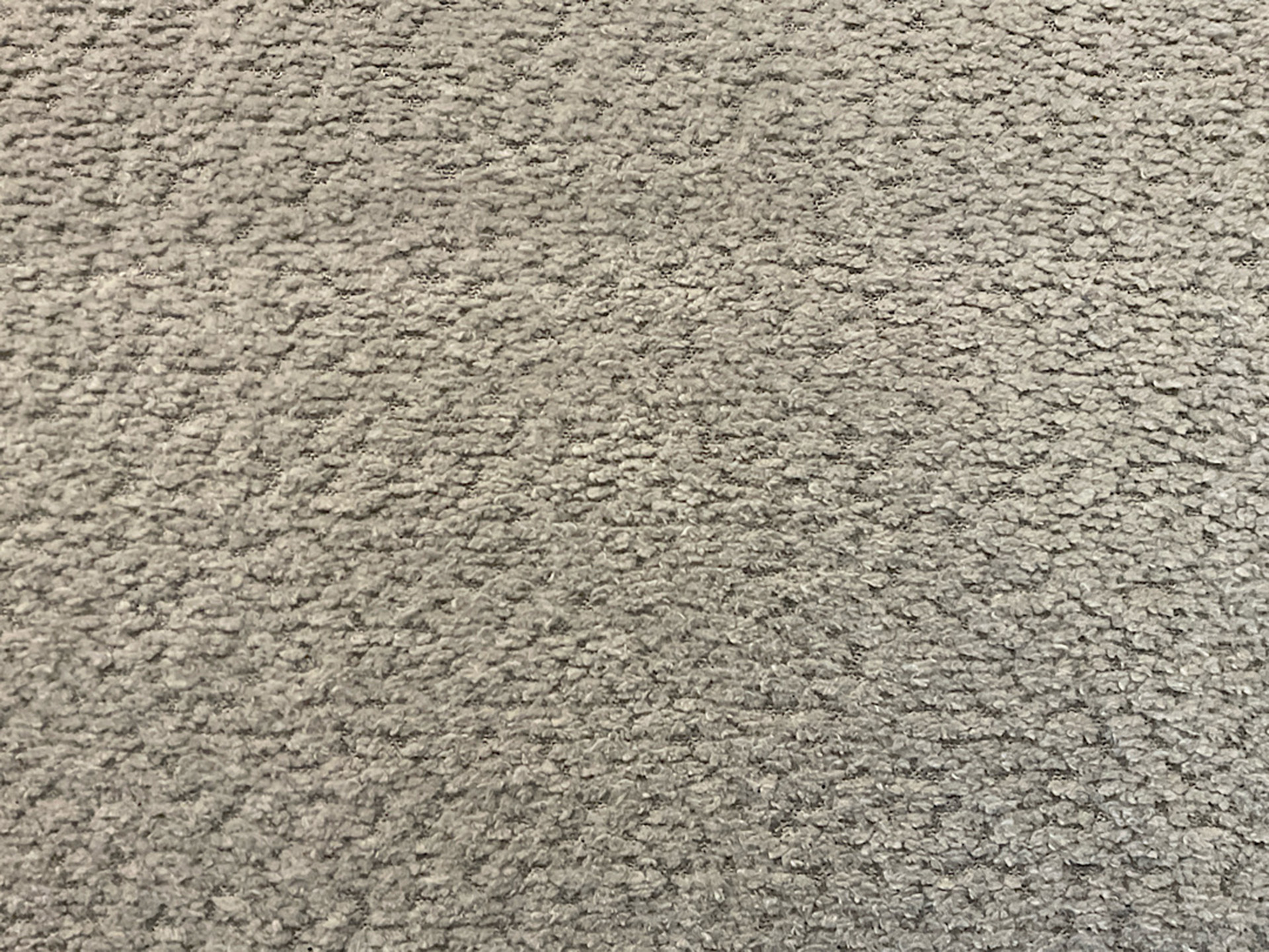 Modulmaster Ecksofa inkl. vielen Funktionen und Hocker in Boucle Stoff