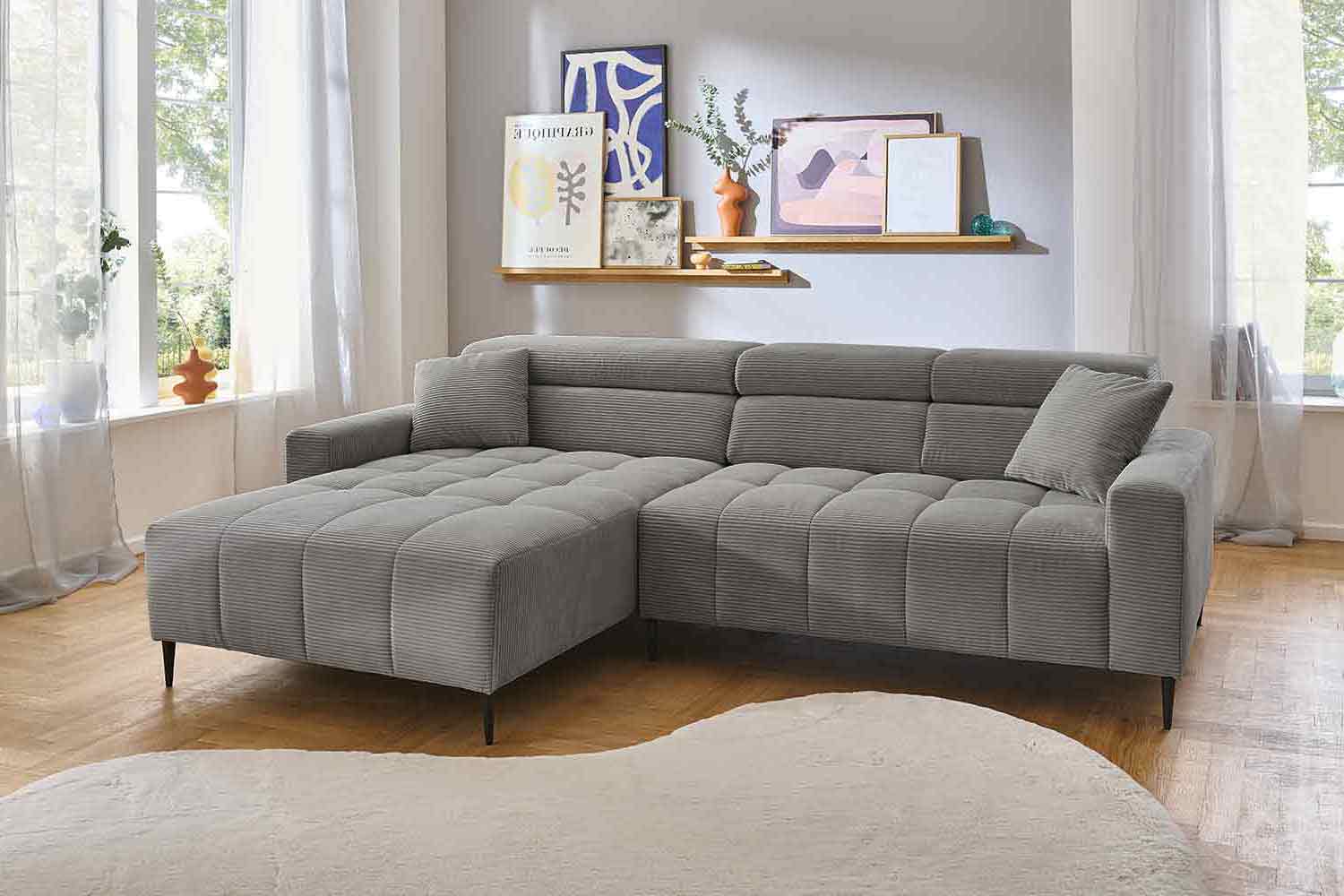 Ecksofa inkl. motorischem Sitzvorzug in Trendstoff Cord
