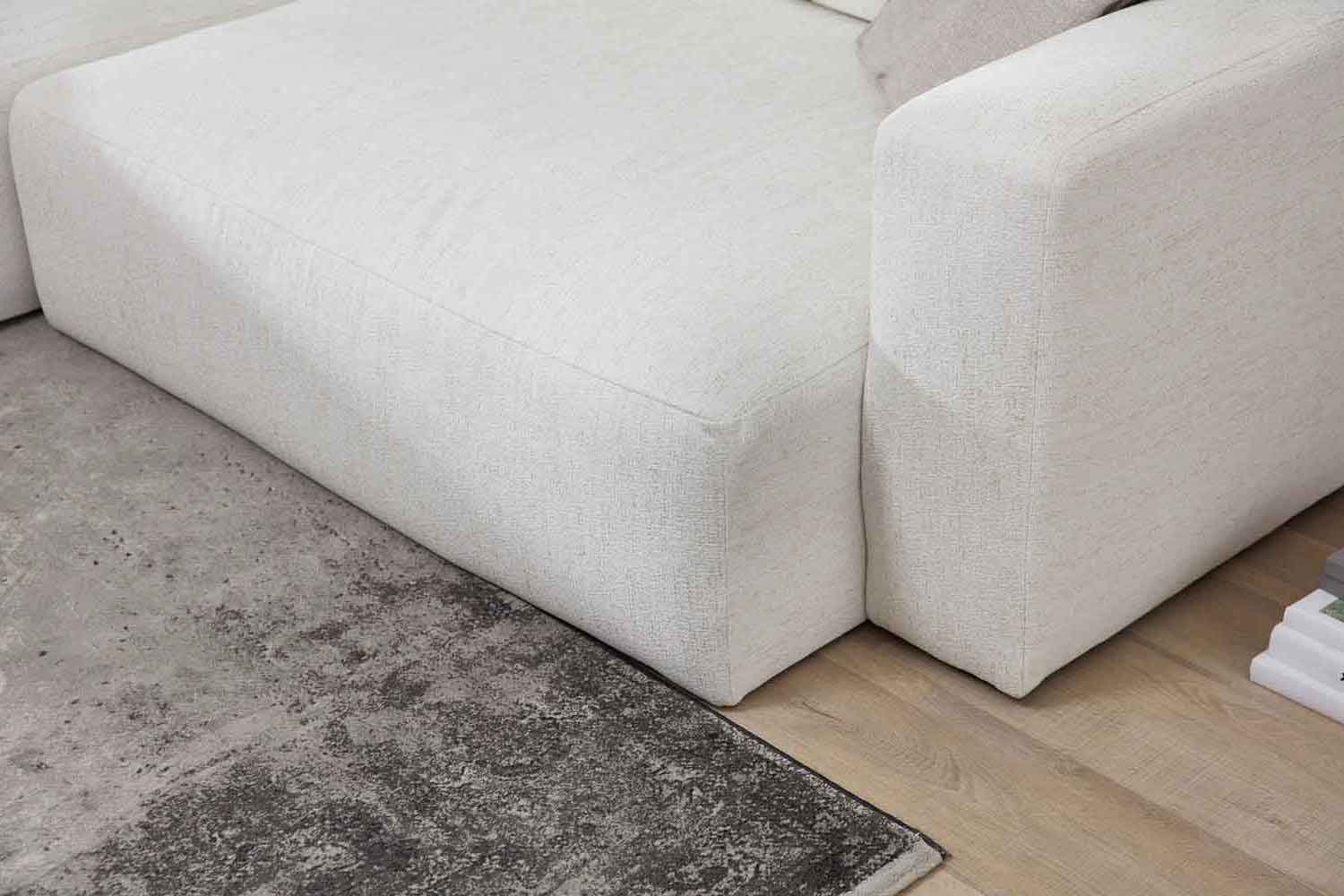 Stoff Ecksofa in L-Form in Trendfarbe natur