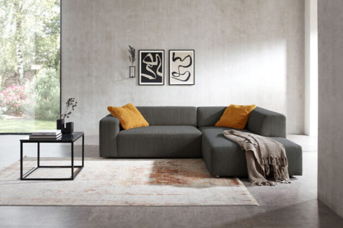Ecksofa im Trendstoff Cord mit elektrischem Sitzvorzug mgl. Anthrazit rechts