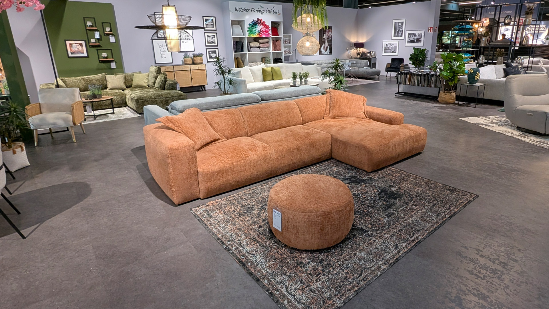 Ecksofa inkl. Rundhocker in Stoff 