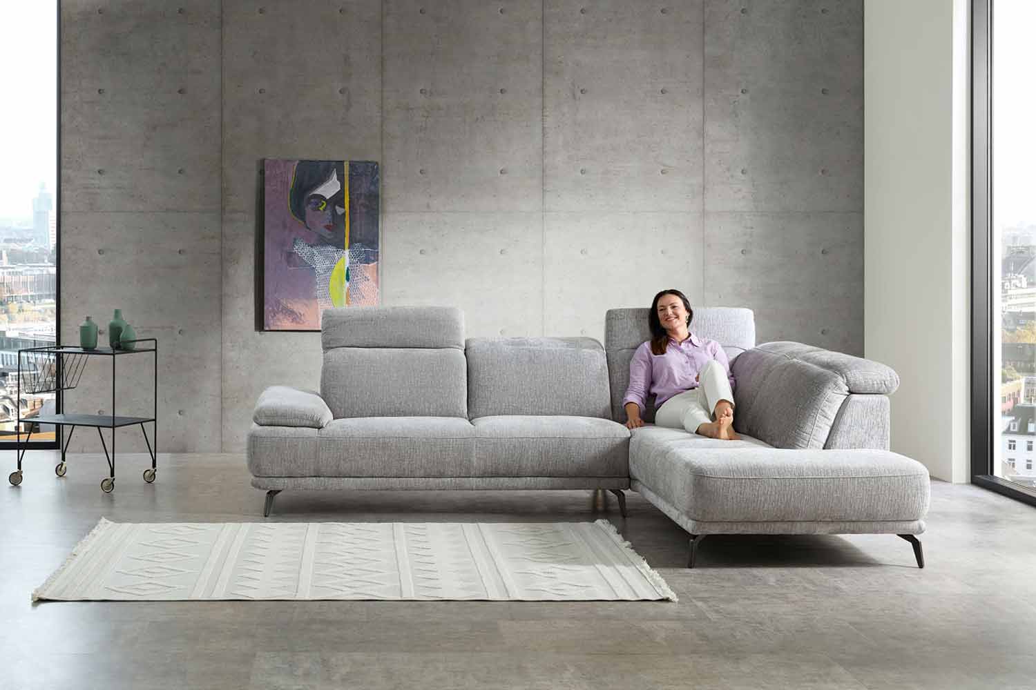 Ecksofa inkl. Kopfteilverstellung in Stoff