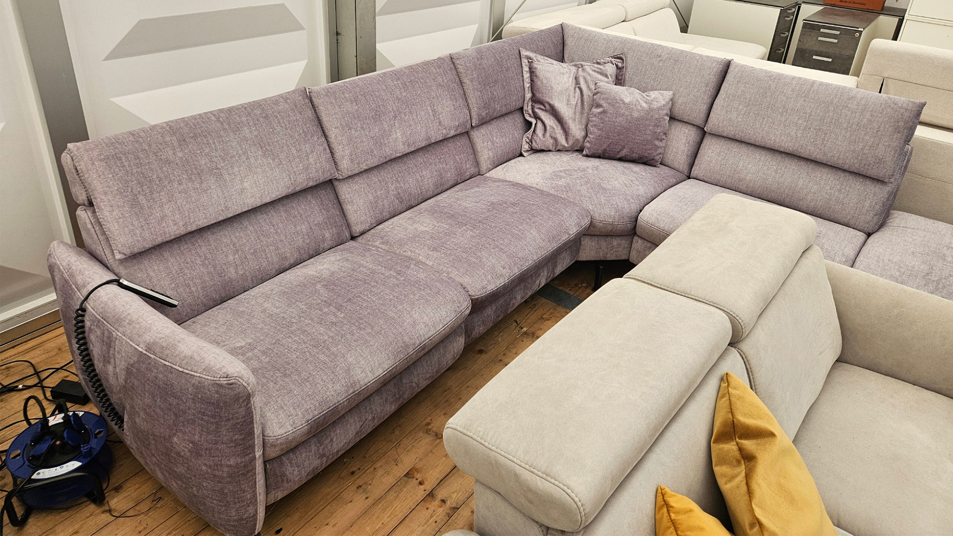 Thomas Brunner Ecksofa mit motorischer Relaxfunktion in Stoff