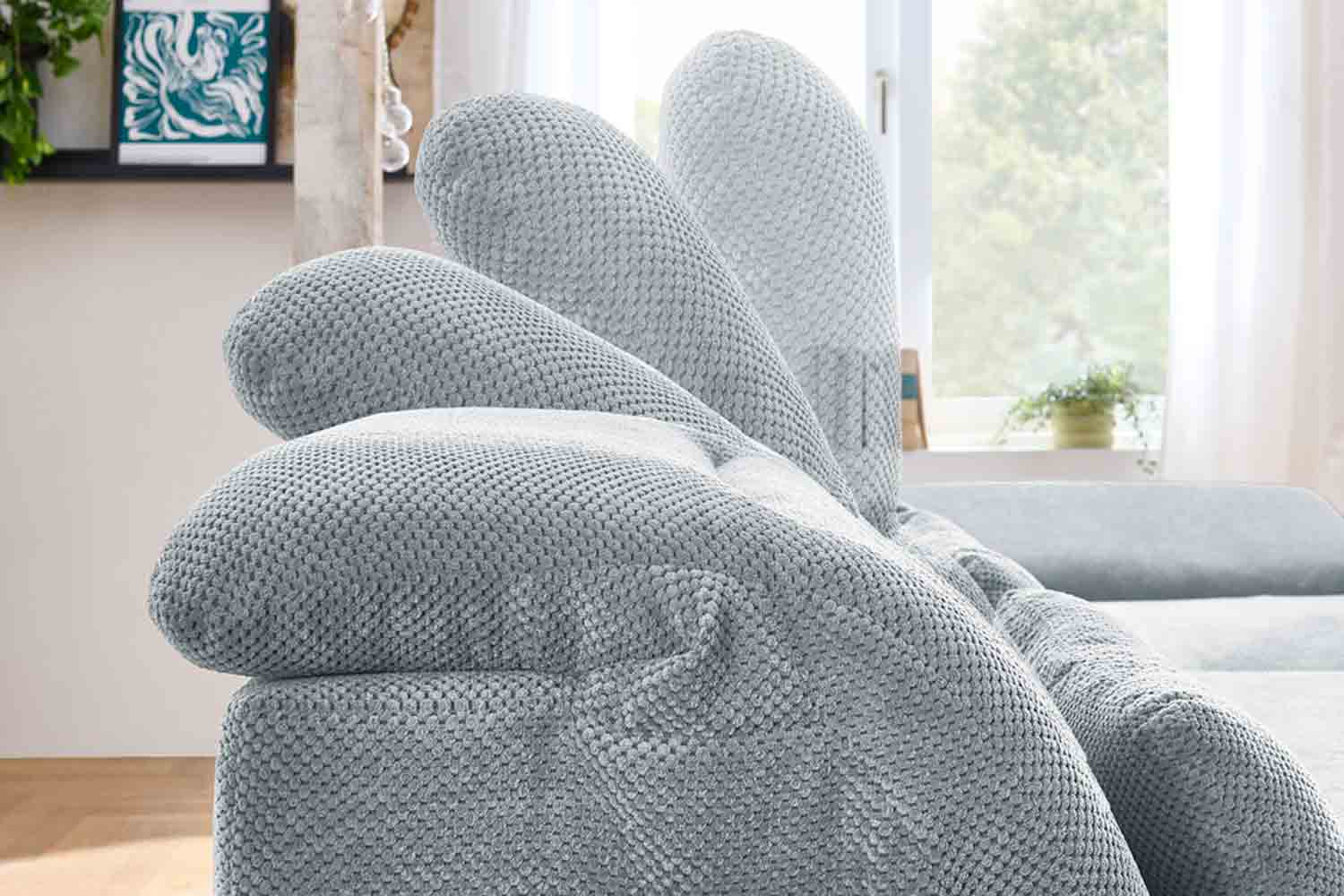Ecksofa inkl. motorischen XL- Sitzvorzug in Stoff