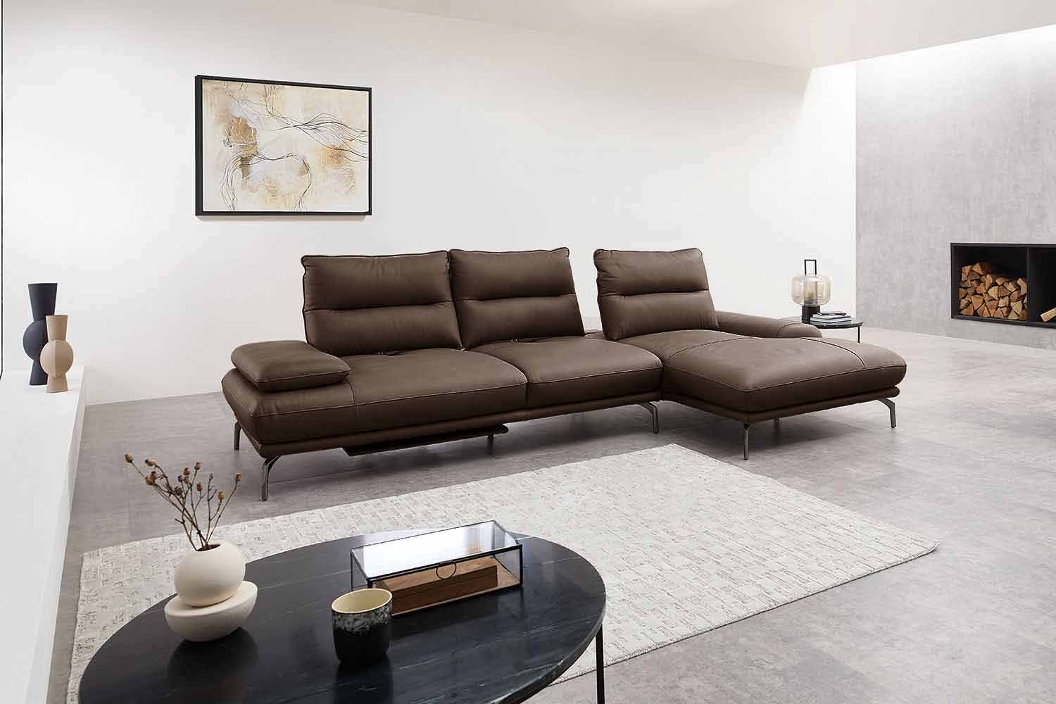 Leder Ecksofa mit manueller Sitztiefenverstellung Leder Ecksofa mit manueller Sitztiefenverstellung