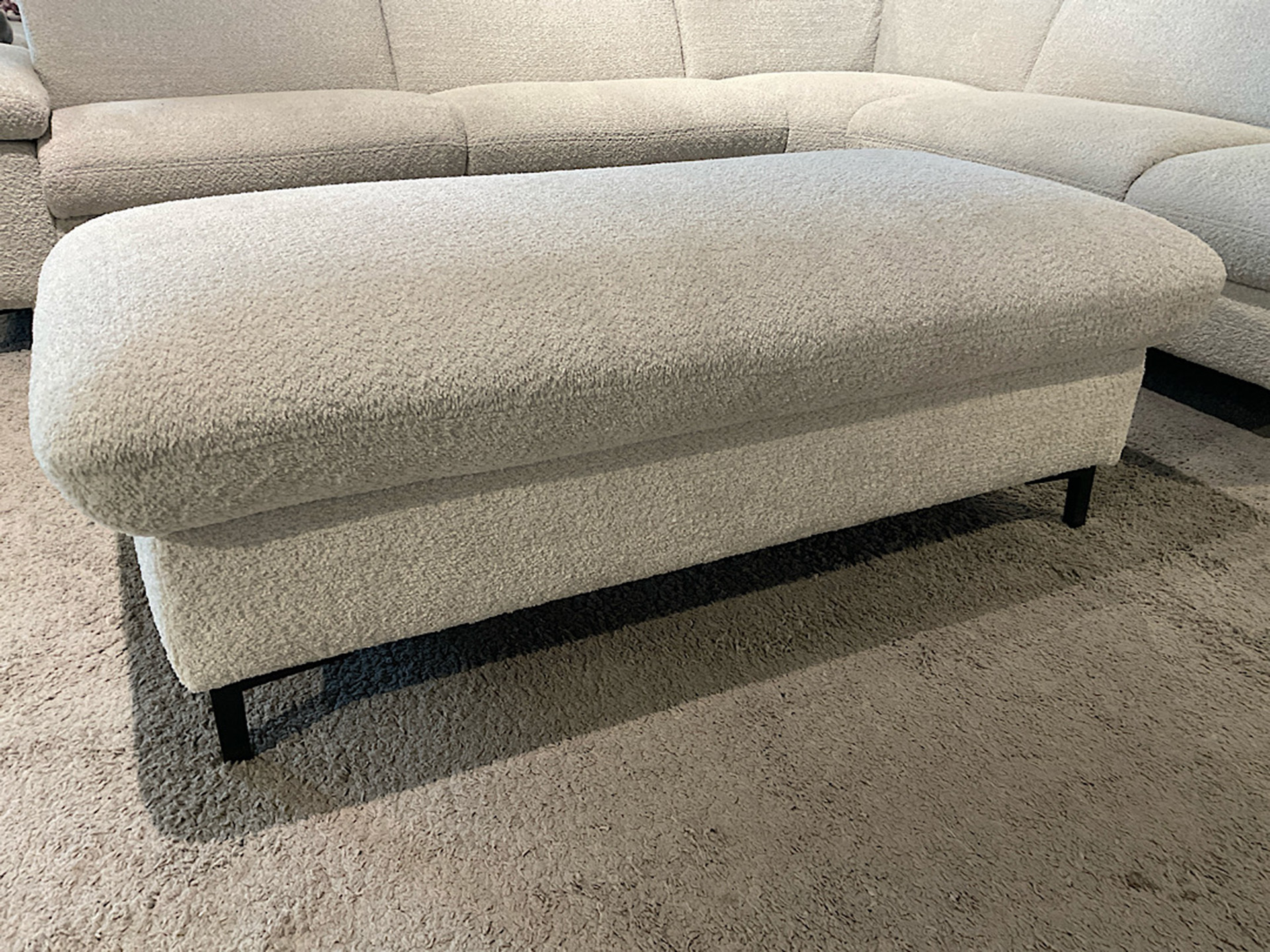 Modulmaster Ecksofa inkl. vielen Funktionen und Hocker in Boucle Stoff