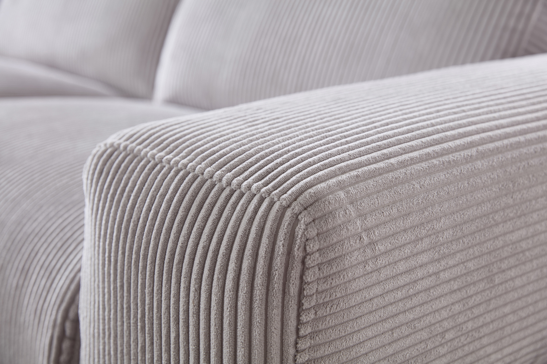 Cuoio Ecksofa in Trendstoff Cord