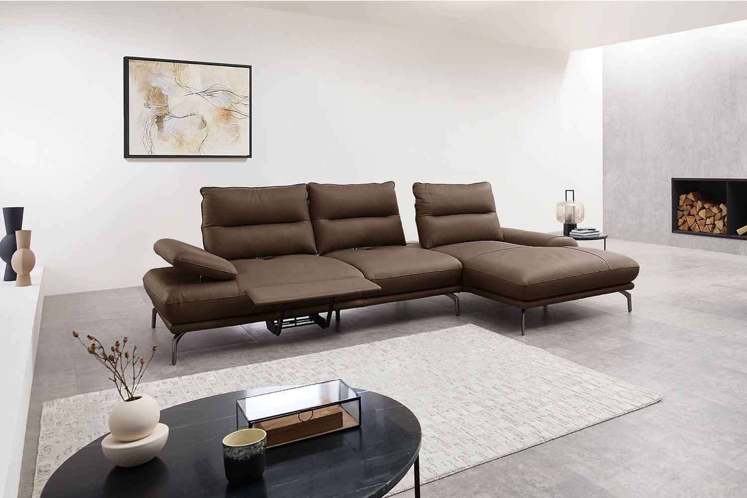 Leder Ecksofa mit manueller Sitztiefenverstellung Leder Ecksofa mit manueller Sitztiefenverstellung