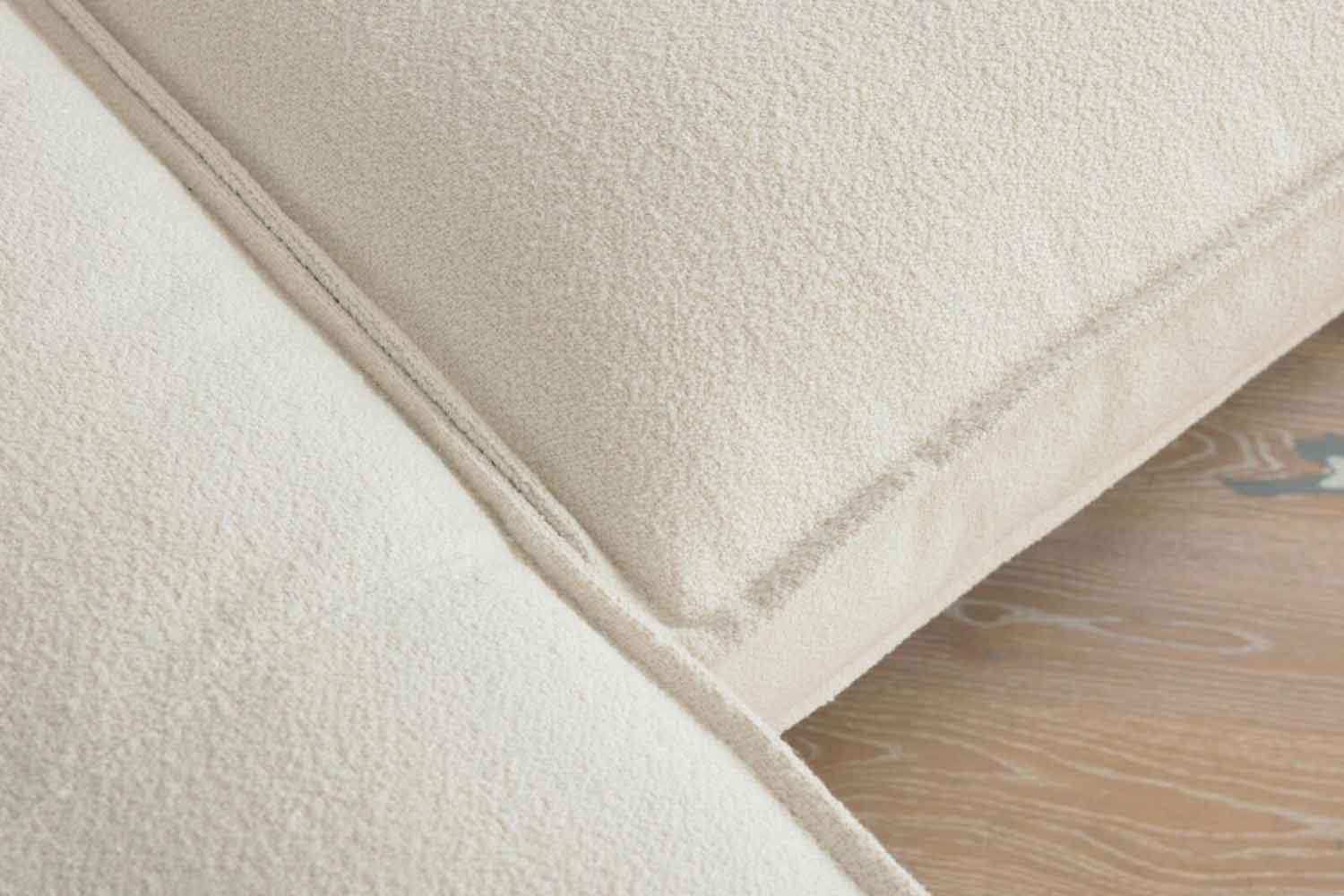 Ecksofa Roomio 4102 in Trendstoff Bouclé 