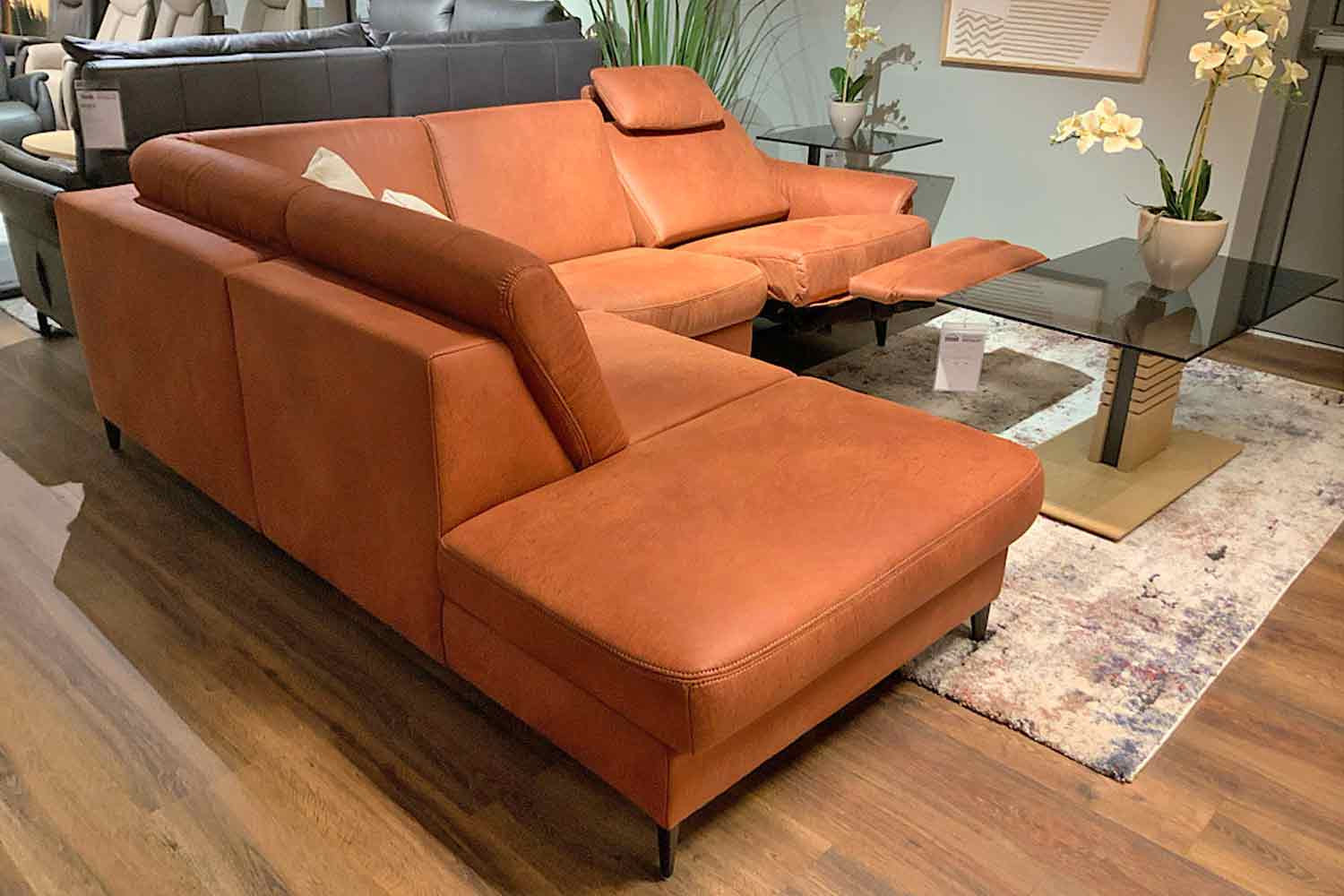 Stoff Ecksofa inkl. motorischer Relaxfunktion mit Federkern