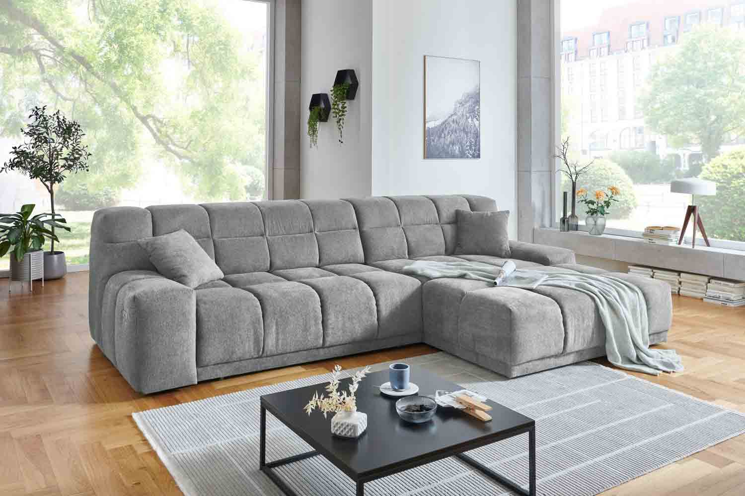 Ecksofa inkl. motorischen XXL- Sitzvorzug in Stoff