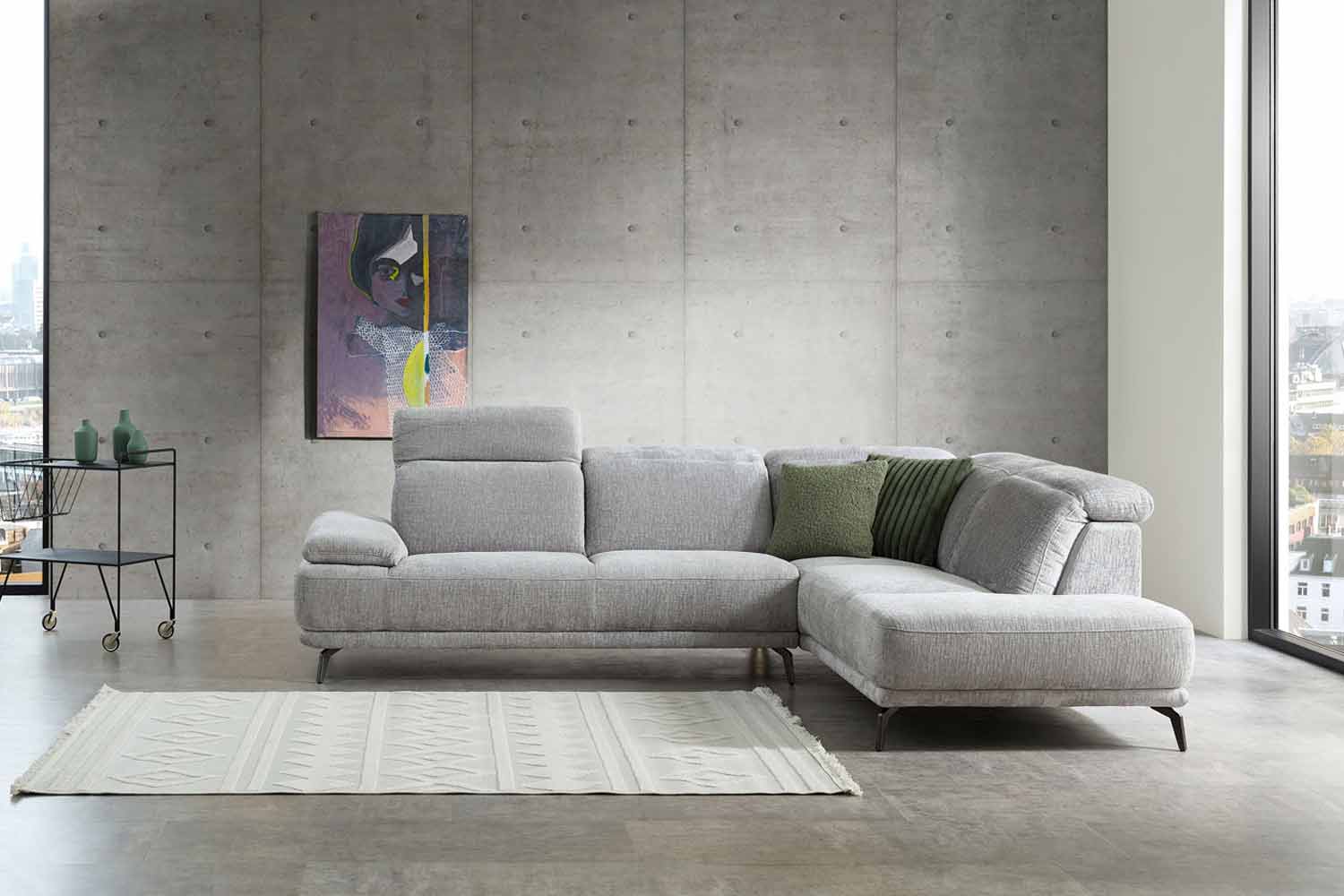 Ecksofa inkl. Kopfteilverstellung in Stoff