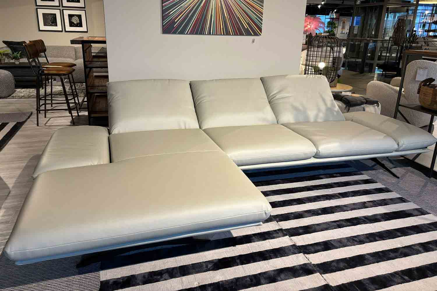 Koinor Ecksofa inkl. Funktionen und Hocker in Leder 